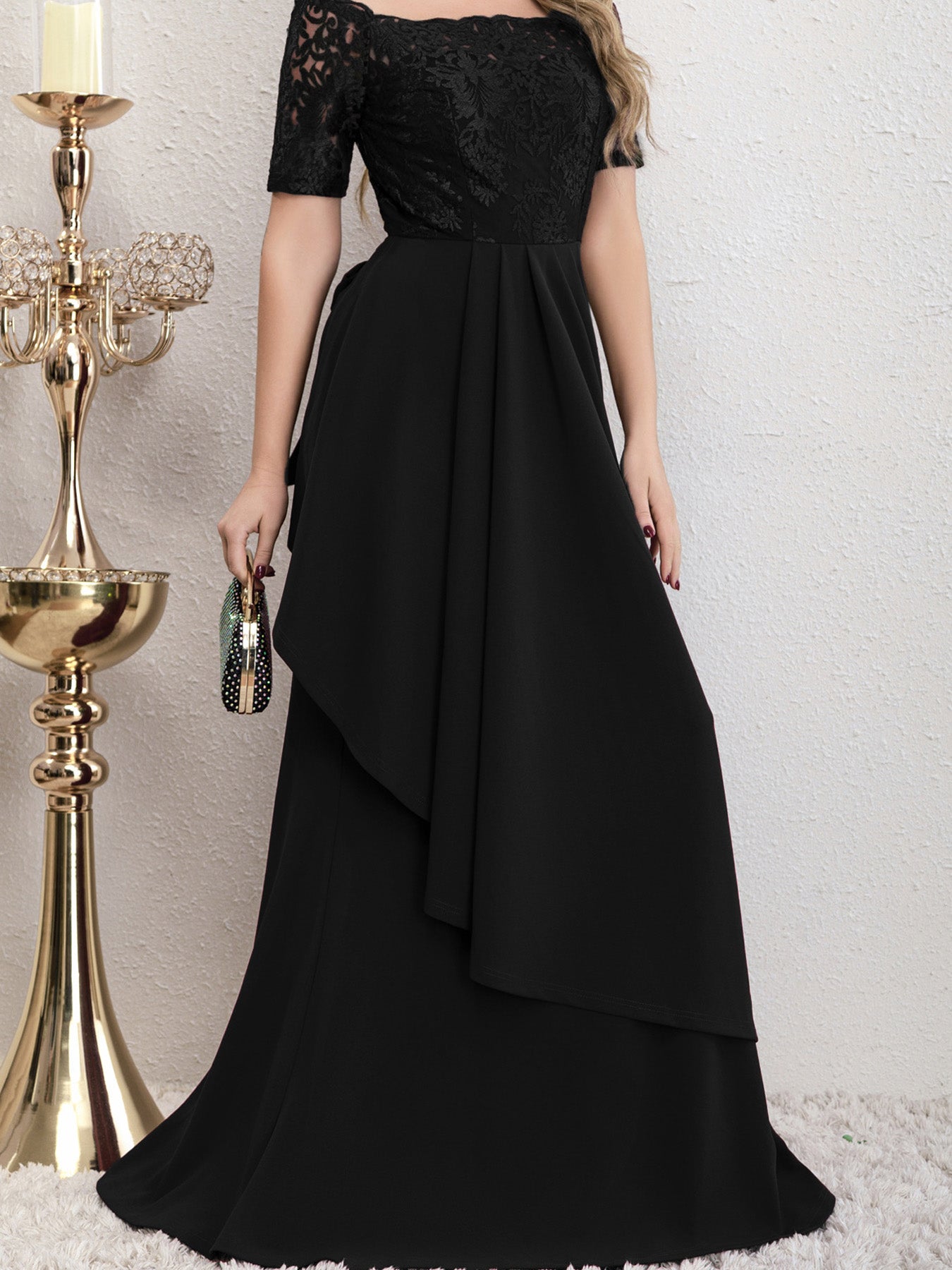 Close-up detail view of the Yedda black short sleeve embroidered lace spliced A-line dress, showcasing intricate lace embroidery and fine craftsmanship.