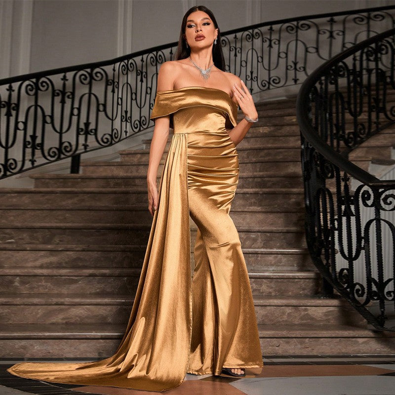 Side view of the Gold Off-Shoulder Satin Evening Dress showcasing the sleek silhouette and flowing maxi design.
