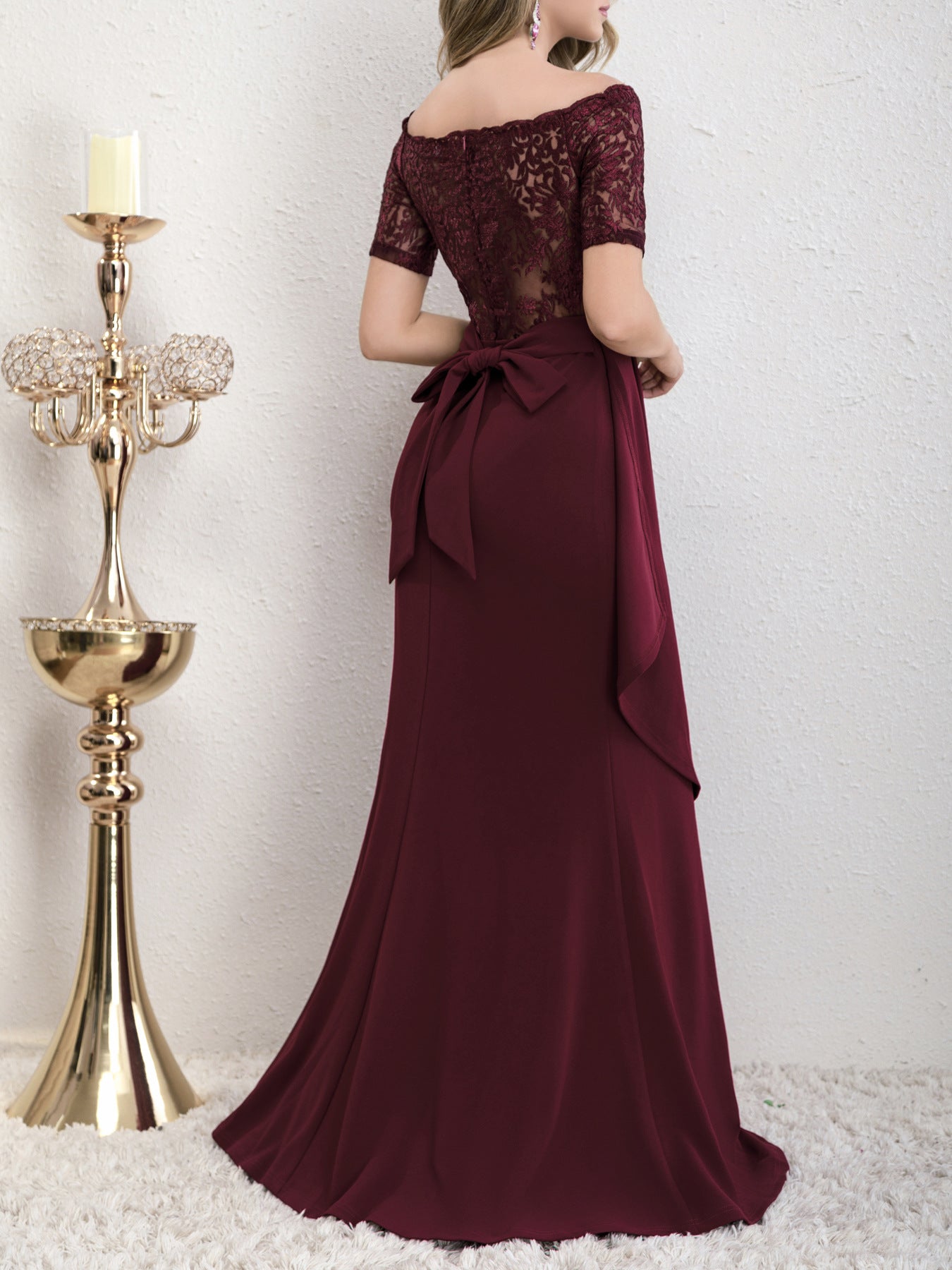 Back view of the Yedda wine red short sleeve embroidered lace spliced A-line dress, featuring the lace splicing and bow detail.