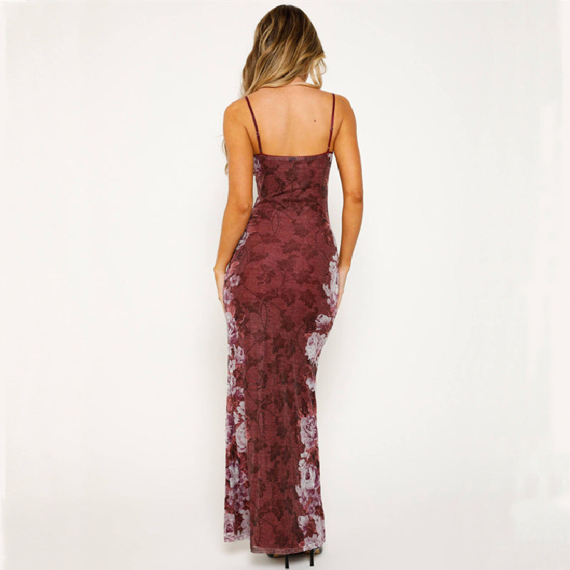 Back view of the wine red mesh suspender maxi dress highlighting its backless design and adjustable suspender straps for a graceful and flattering fit.