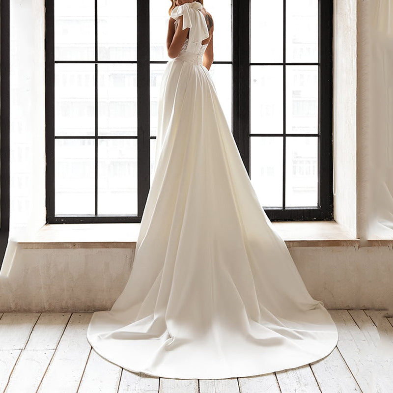 Back view of the White Sleeveless One Shoulder Tie Sequined Evening Dress, showcasing the chic backless design and flowing silhouette.