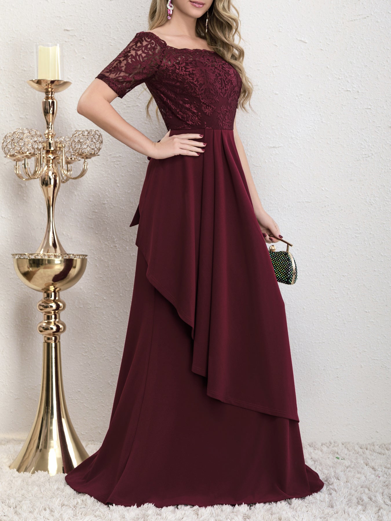 Side view of the Yedda wine red short sleeve embroidered lace spliced A-line dress, highlighting the flattering A-line silhouette and flowing pleated skirt.